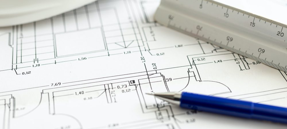 Close up of an Architecture plan, mechanical pencil and technical ruler
