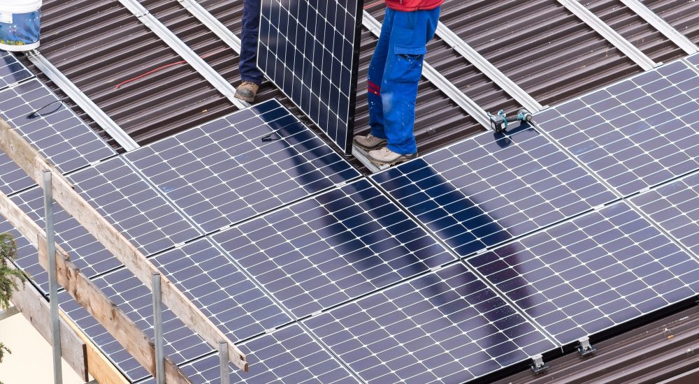 Solar panel and workers.